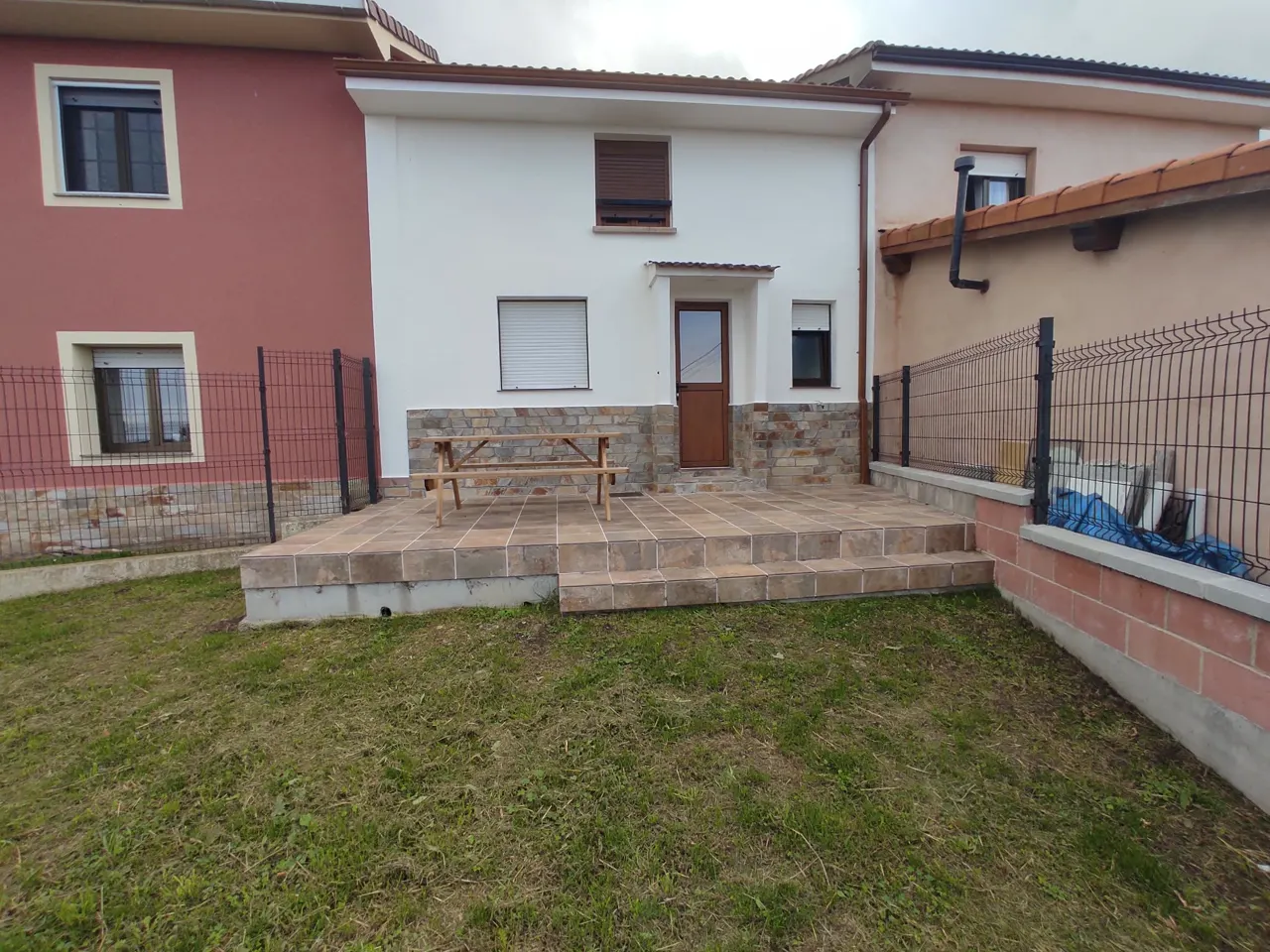 Private enclosed back garden with terrace