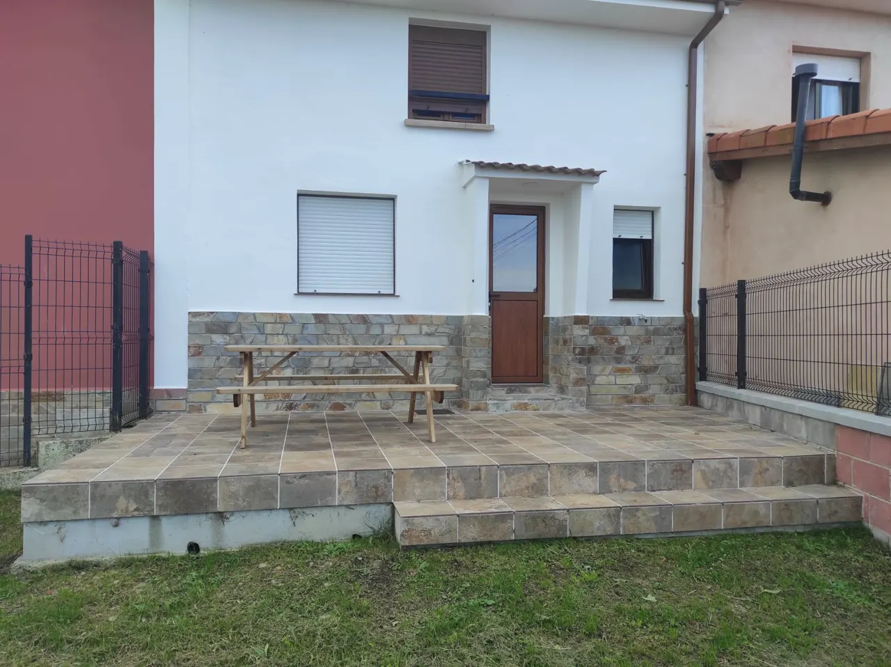 Back terrace with outdoor dining table